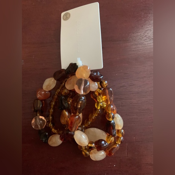 Forever 21 Jewelry - New Forever 21 5 bracelet set brown colored stretchy